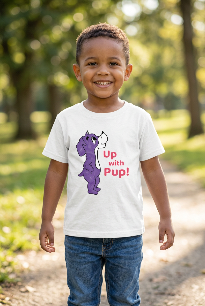 Child wearing a white Up with Pup! T-shirt with a purple pup graphic outdoors in a park.