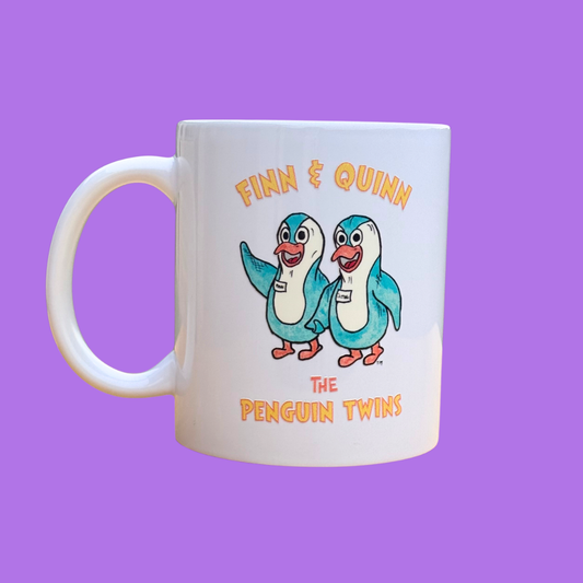 Mug with 'Finn & Quinn, The Penguin Twins' design on a purple background. Inspired by Priscilla in the Purple Hood. 
