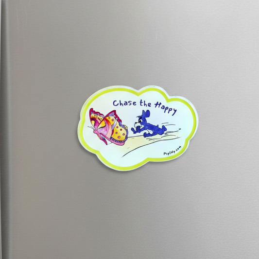 Colorful magnet  with a butterfly and a purple cartoon dog named Prpl Up Pup and text 'Chase the Happy' on a acrylic surface.
