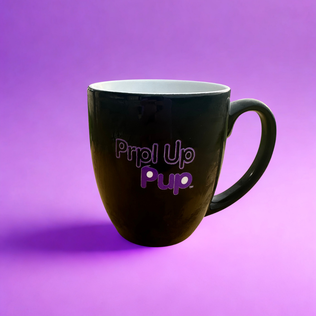 Black 16 oz mug with a light purple background. Illustrations from the world of Prpl Up Pup. 