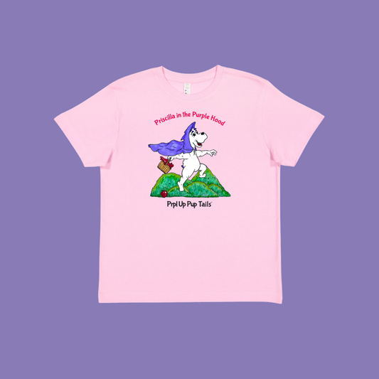Pink t-shirt with a white cartoon character design on a purple hood, Priscilla. She is Prpl Up Pup little sister. The illustration is inspired by Priscilla in the Purple Hood picture book. 