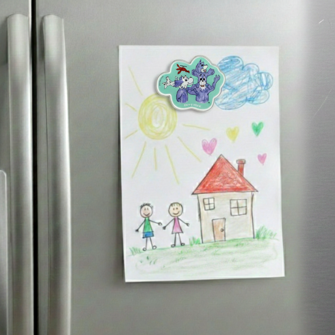 Children's drawing of a house, sun, and two people on a refrigerator. An acrylic magnet of Prpl Up Pup family holding the drawing sheet. 