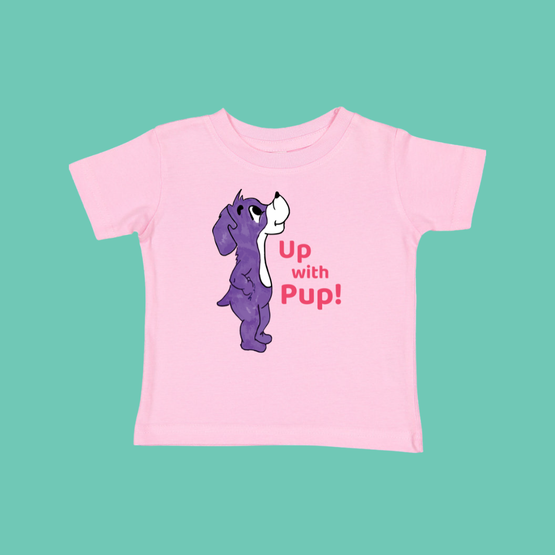 Pink t-shirt with a purple dog graphic and 'Up with Pup!' text on a teal background. This is Prpl Up Pup cartoon character from Up, Up, Pup! picture book.