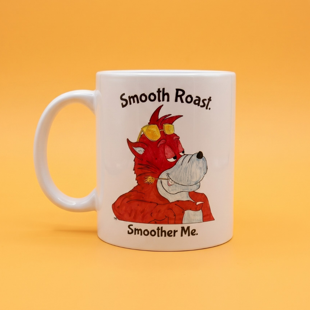 Wally Wolf mug. A white ceramic coffee mug featuring a cartoon illustration of a red wolf wearing yellow sunglasses and a red suit, with the text 'Smooth Roast.' above and 'Smoother Me.