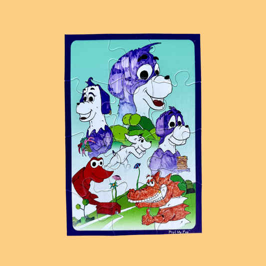 Children's puzzle with cartoon characters from the World of Prpl Up Pup on a beige background