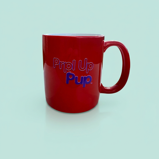 Vermilion Pig-o'-lantern mug showing the Prpl Up Pup logo on a pale teal background