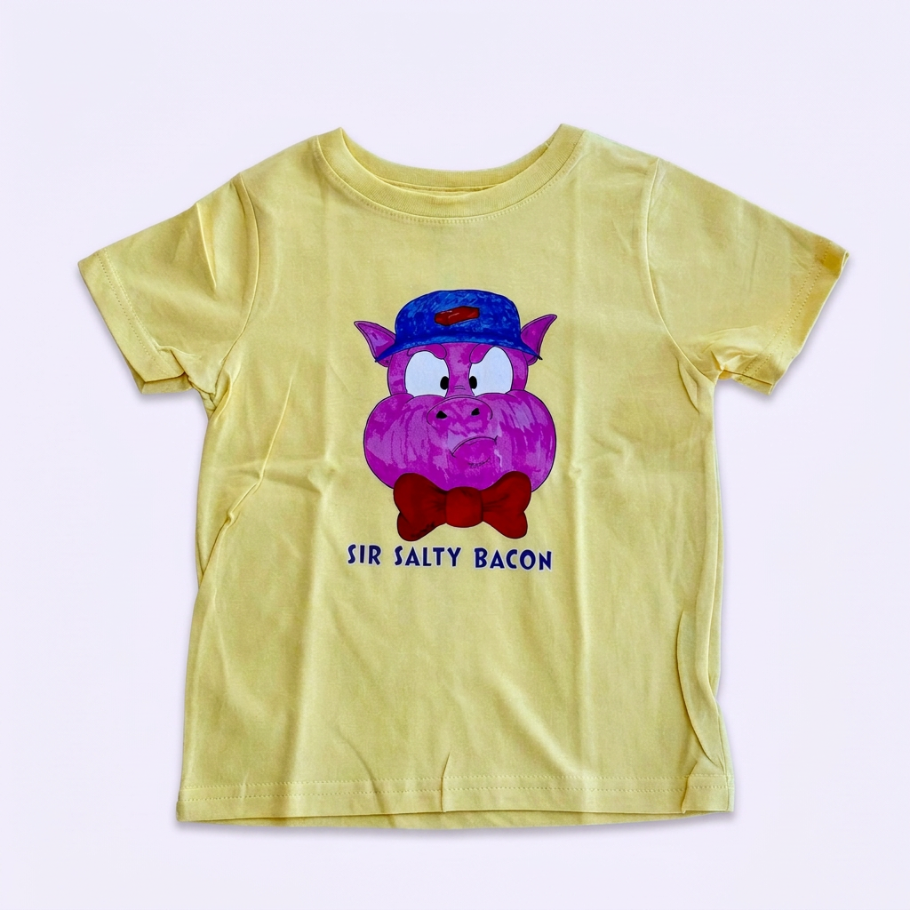 Yellow Sir Salty Bacon kids' T-shirt with Pig 1 artwork on a pale lavender background