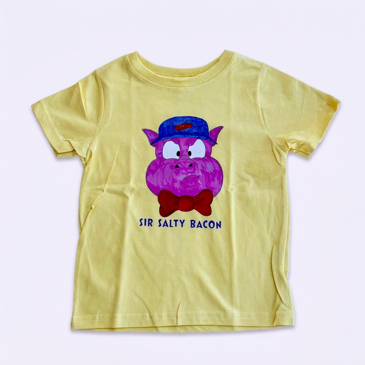 Yellow Sir Salty Bacon kids' T-shirt with Pig 1 artwork on a pale lavender background