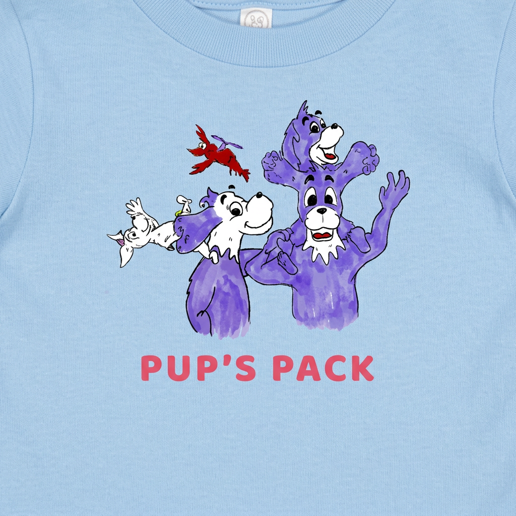 Close-up of the purple dog family graphic and pink Pup's Pack lettering on a light blue kids T-shirt.
